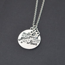 "The ROAD TO MY Heart,IS PAVED WITH Paws" Dog Paw Print Pet Memorial Necklace