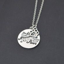 "The ROAD TO MY Heart,IS PAVED WITH Paws" Dog Paw Print Pet Memorial Necklace
